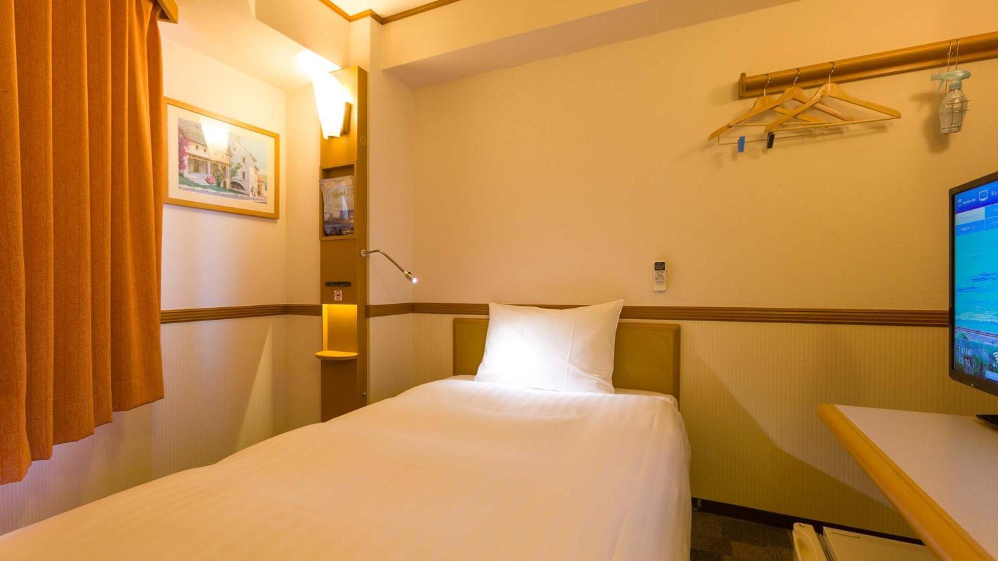 Toyoko Inn Okayama Eki Nishi Guchi Hiroba Rum bild