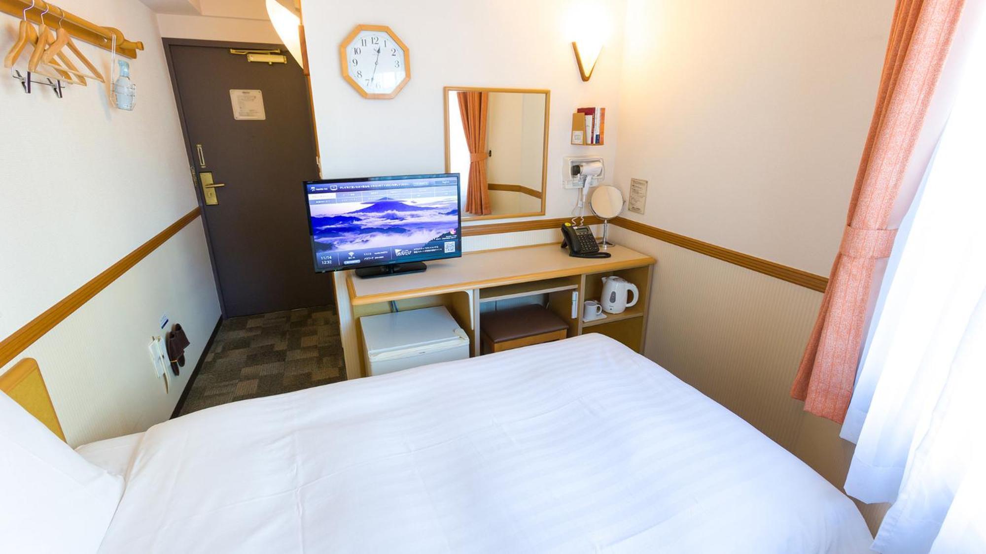 Toyoko Inn Okayama Eki Nishi Guchi Hiroba Rum bild